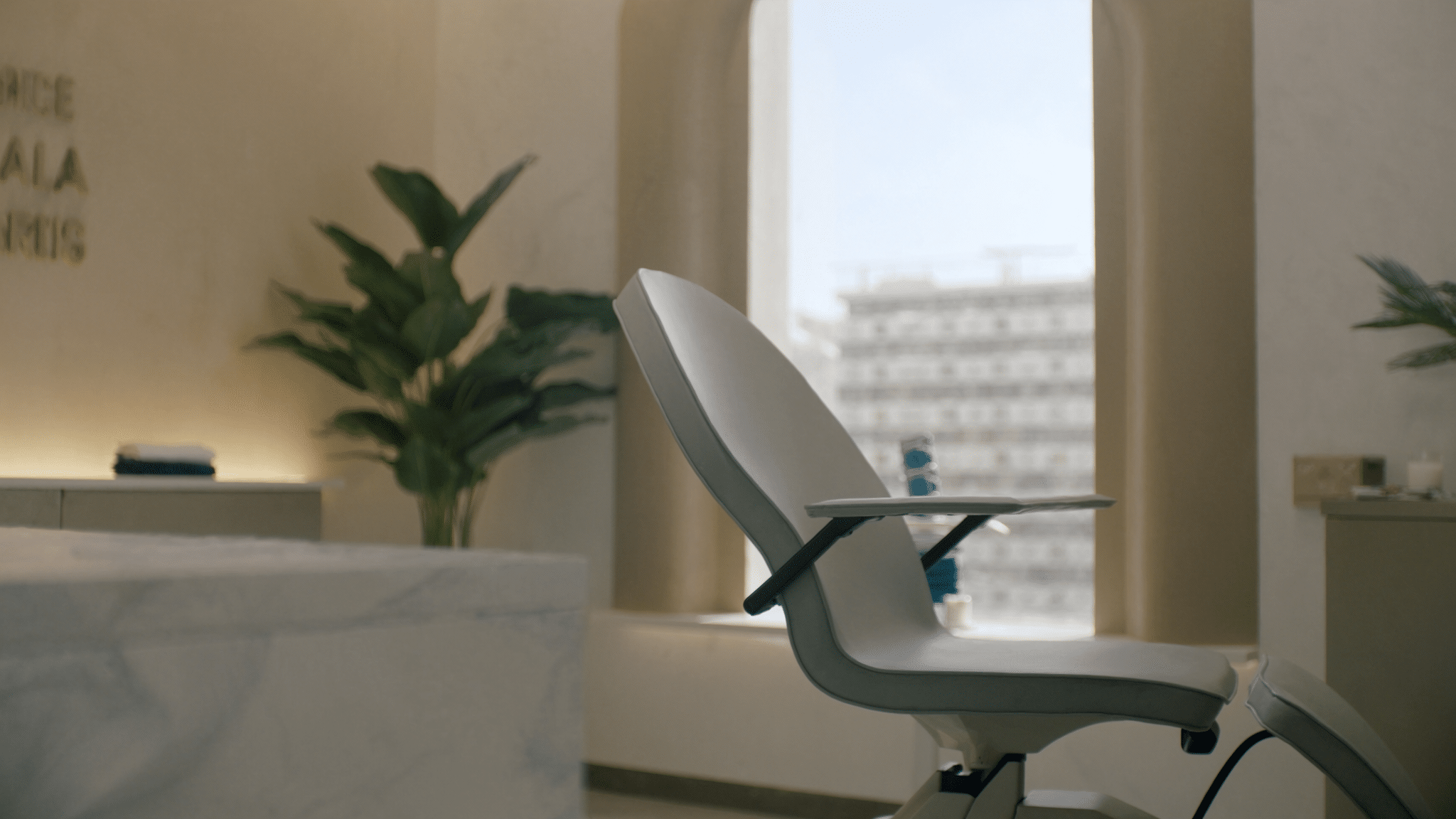 A calm, modern cosmetic clinic consultation room in North Sydney with natural light
