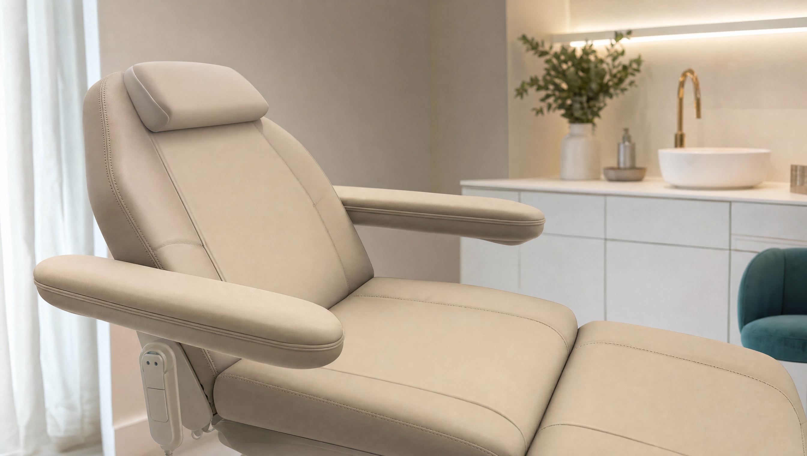 A calm, empty treatment room at a doctor-led cosmetic clinic in North Sydney, with a treatment chair, folded linen and soft natural light, prepared for a lip enhancement consultation